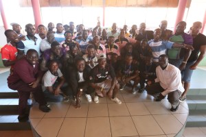 Group picture of Mr. Herbert Mensah,Rugby Players, Executives of GRFU and  rugby coached